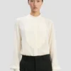 Cămașă cu detaliu bib în culoarea ivoriu Cămașă cu detaliu bib în culoarea ivoriu