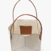 Geantă tote The Victoria mare din pânză de culoare ivoriu Geantă tote The Victoria mare din pânză de culoare ivoriu