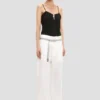 Pantaloni cu croi drept și tiv pliat, în culoarea alb-crem Pantaloni cu croi drept și tiv pliat, în culoarea alb-crem